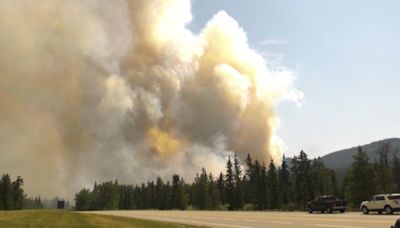 'Praying for the people': Tourists' plans derailed after flames tear through Jasper