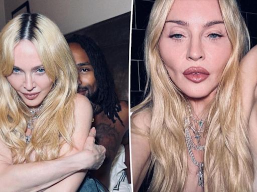 Madonna, 65, poses without a shirt on alongside much-younger rumored love interest