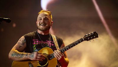 Zach Bryan Plays It Cool as Fan Rushes Stage During New Orleans Concert