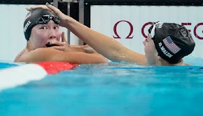 American swimmer Torri Huske edges teammate Gretchen Walsh by just .04 seconds in 100 butterfly