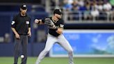 Pirates outlast Marlins in 12 innings to kick off season