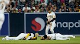 Padres' Profar collapses after collision, taken off on cart