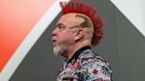 Peter Wright crashes out in New Zealand to truck driver Jonny Tata