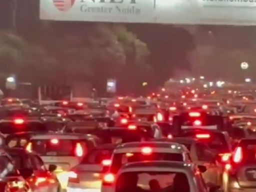 Delhi-Noida flyway hit by traffic congestion after rainfall leaves roads waterlogged | Video