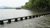 中國暴雨未歇紅色預警持續 杭州防汛形勢嚴峻西湖罕見洩洪