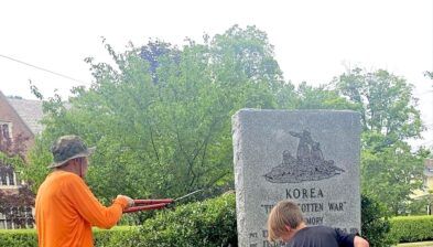 Generations come together to clean up memorials at General Joseph Warren Park