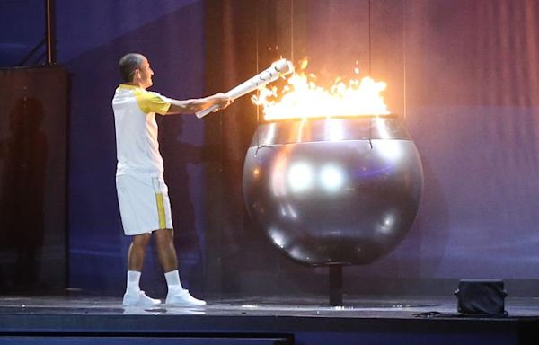 Who lit the Olympic flame? Meet France's final torch bearers for 2024 opening ceremony | Sporting News