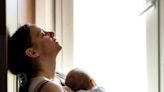 What is postpartum depression and what are the symptoms?