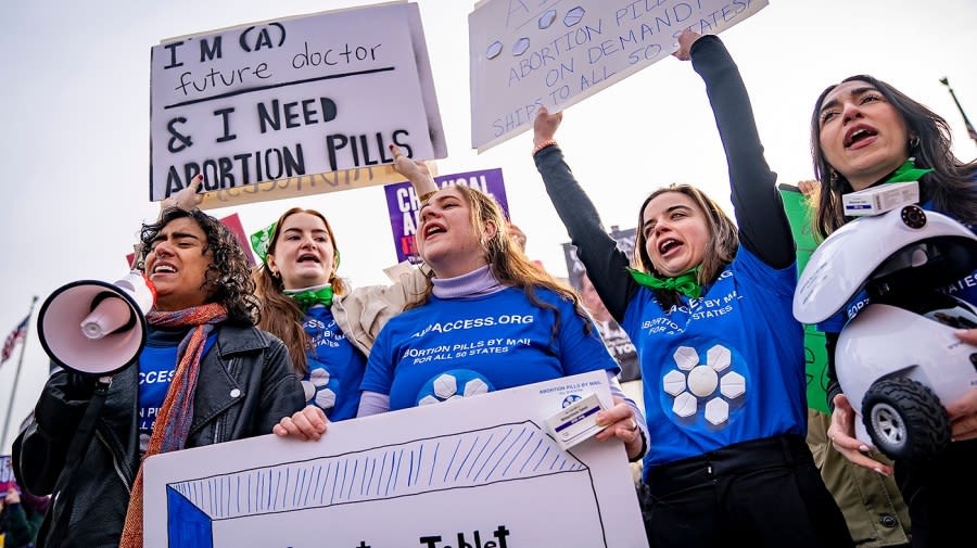 Red state abortion bans headed for clash with blue state shield laws