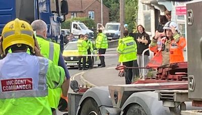 Lorry rode pavement before hitting house with children in