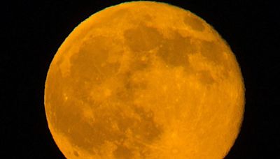 June's full moon, the Strawberry Moon, could be big and colorful this year. Here's why