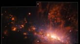 Giant Galactic Explosion Reveals Cosmic Pollution Dynamics