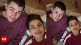 Priyanka Chopra lazy Saturday night with hubby Nick Jonas gives out couple goals - Pic | - Times of India