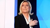 Fresh from a rousing French election, Le Pen faces probe into her 2022 presidential contest