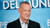 Tom Hanks Hits the Red Carpet With Wife Rita and Son Truman
