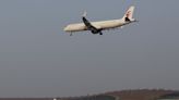 China's top airlines post record annual losses, outlook brighter