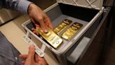 Gold loses momentum on ebbing rate cut speculation