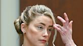 Amber Heard calls Johnny Depp a 'sellout' and 'washed up piece of s---' in audio recording of a vicious fight played at defamation trial