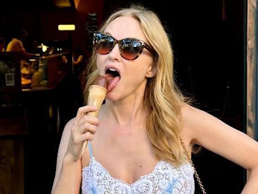 Heather Graham looks so young in plunging dress during romantic getaway