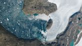 Earth from space: Mysterious wave ripples across 'galaxy' of icebergs in Arctic fjord