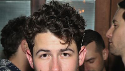 Nick Jonas Debuts Shaved Head in New Photo With Daughter Malti Marie - E! Online