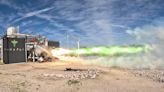 Firefly Aerospace's new rocket engine spouts green flames in 1st 'hot fire' test (photo)