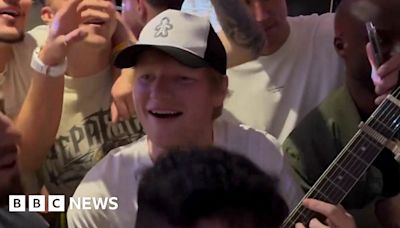 Ed Sheeran and Ipswich Town players celebrate promotion