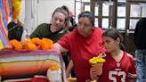 Des Moines students make an ofrenda for Día de Los Muertos at Capitol View Elementary