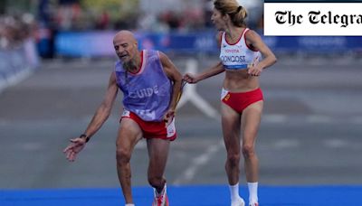 Paralympics marathon runner stripped of medal after helping guide with cramp metres from finish