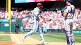 Wheeler tosses 7 strong innings, Realmuto homers as Phillies beat Rangers 5-2 for 3-game sweep