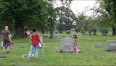 Newport News American Legion Post 25 lays flags at veterans' graves