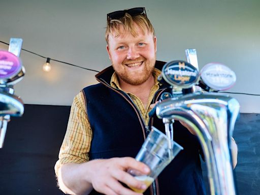 Kaleb Cooper snaps selfies and pulls (non-Hawkstone) pints at shopping festival