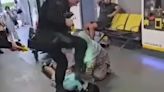 Man kicked in face by airport cops 'has a cyst on his brain', lawyer claims