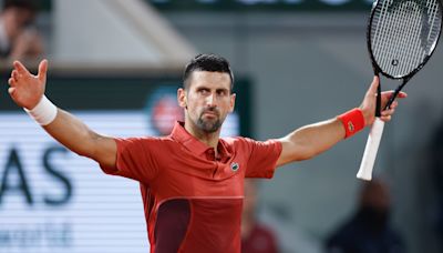 Novak Djokovic into French Open last 16 after early hours five-set epic