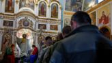 Ukrainians in embattled east mark third Easter under fire