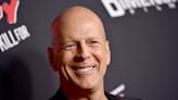 Bruce Willis Strikes a Pose in Rare Photo With Daughter Tallulah
