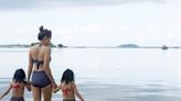Wear the bathing suit and let your kids see you happy and confident in it