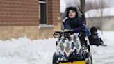 Howard-Suamico first-grader uses wheelchair to plow snow thanks to principal's invention