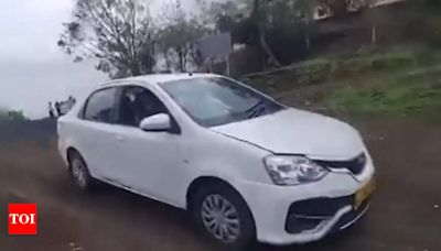 Watch: Tragic end for Mumbai woman shooting video as Toyota Etios falls in 300 feet pit - Times of India