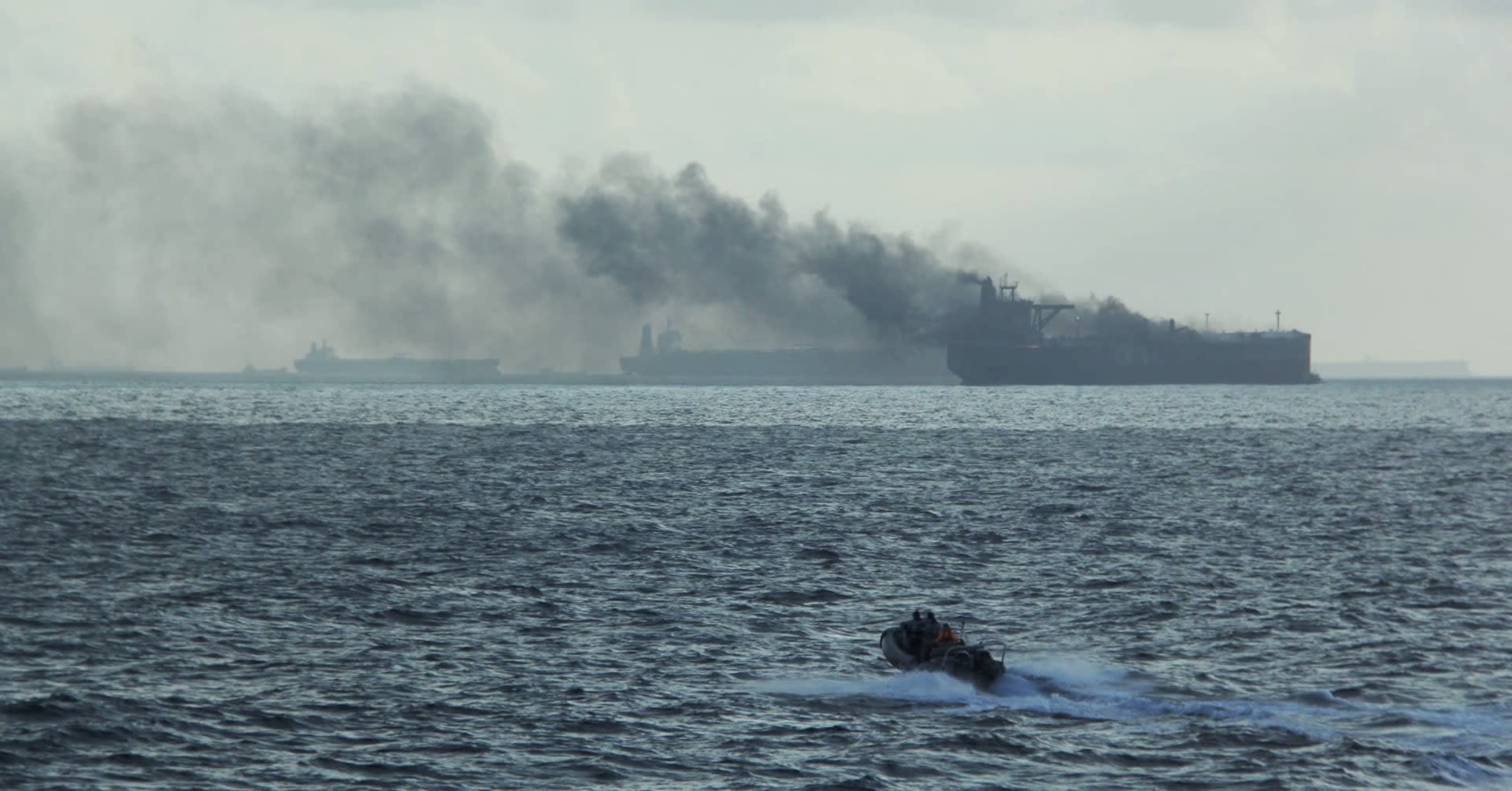 Oil tankers on fire after colliding close to Singapore, crew rescued