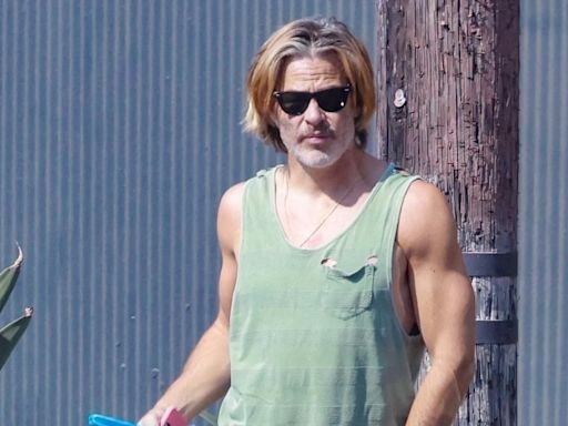 Chris Pine showcases his buff arms as he steps out in Los Angeles