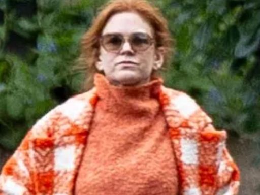 Stony-faced Isla Fisher goes for a stroll after split from Sacha Baron Cohen