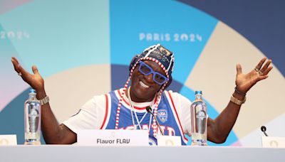 Watch Flavor Flav Meet & Hug Dr. Jill Biden While Cheering Women’s Water Polo at the 2024 Olympics