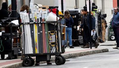 Zombies take to the roof, fans wait below as 'Walking Dead' filming begins downtown