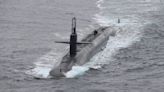 US Navy nuclear ballistic missile submarine surfaces off Norway in unusual flex as 'Doomsday' plane flies overhead