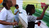 Seeds of Success participants painting new mural in Hertford