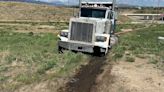 Dump truck takes out light pole in Colorado Springs Thursday morning