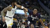 Newton, No. 2 UConn hold off No. 8 Marquette for 74-67 road win