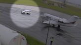 Watch: Hopkins Airport official drives in front of airplane