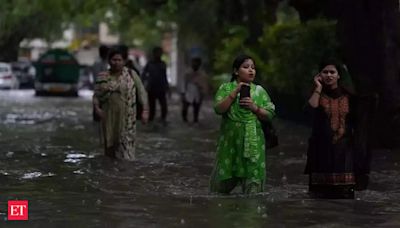 Delhi Rain Misery: Waterlogging, traffic woes, power cuts, airport roof collapse and a death - Delhi receives rain